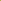 A close-up of Super Cheap Fabrics’ Organza - Yellow - 150cm, showcasing its light yellow, slightly shimmery texture gently folded to form soft, flowing curves.