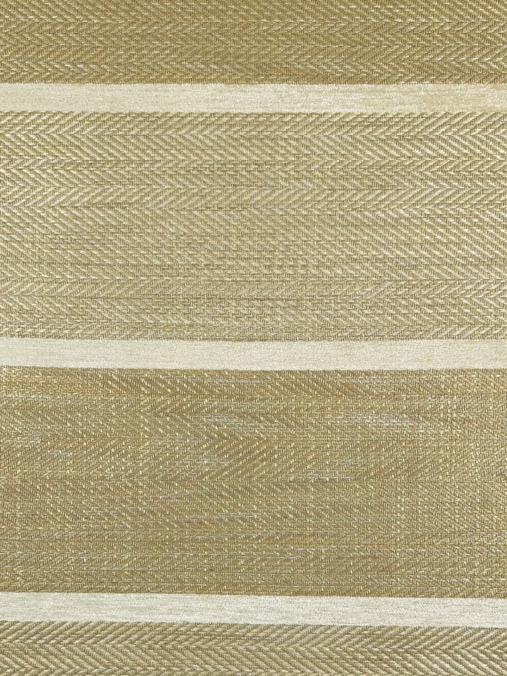 Close-up of Super Cheap Fabrics' Upholstery Herringbone - Hickory, a 148cm heavy-weight upholstery fabric featuring a chevron pattern with alternating beige and cream stripes, creating an elegant design with textured depth.