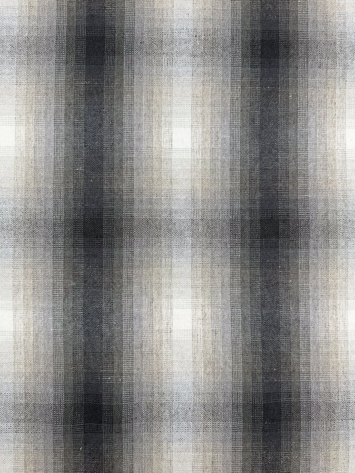 The Pure Linen - Natural - 148cm from Super Cheap Fabrics features a luxury plaid pattern in varying shades of gray, black, and white with elegantly intersecting vertical and horizontal lines for a classic, structured look.