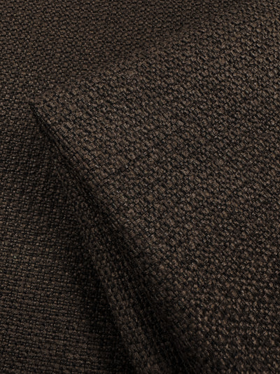 Close-up of the Basket Weave Upholstery - Tuco from Super Cheap Fabrics, featuring a dark brown textured appearance with a coarse basket-like weave. This fabric combines a rugged, heavyweight feel with a rich color and versatile neutral tone. Width: 147cm.