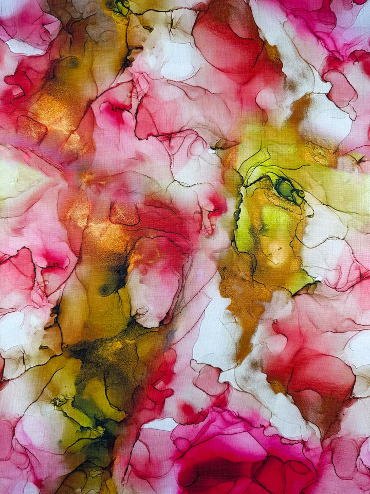 The Designer Cotton - Catalina by Super Cheap Fabrics features abstract swirls of pink, gold, and green that bleed together like watercolor or ink, creating a fluid and dreamy look perfect for luxurious sewing projects.